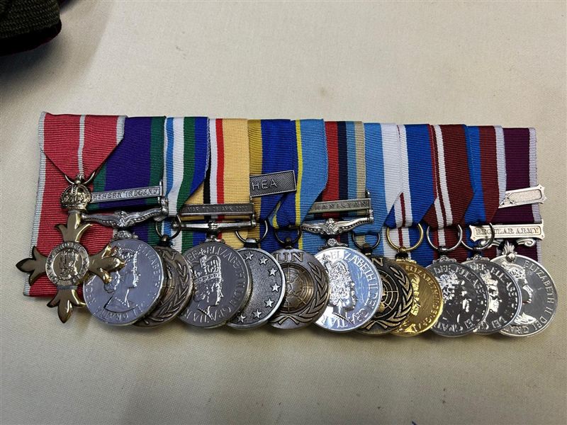 Medals mounted to uniform, photo 1